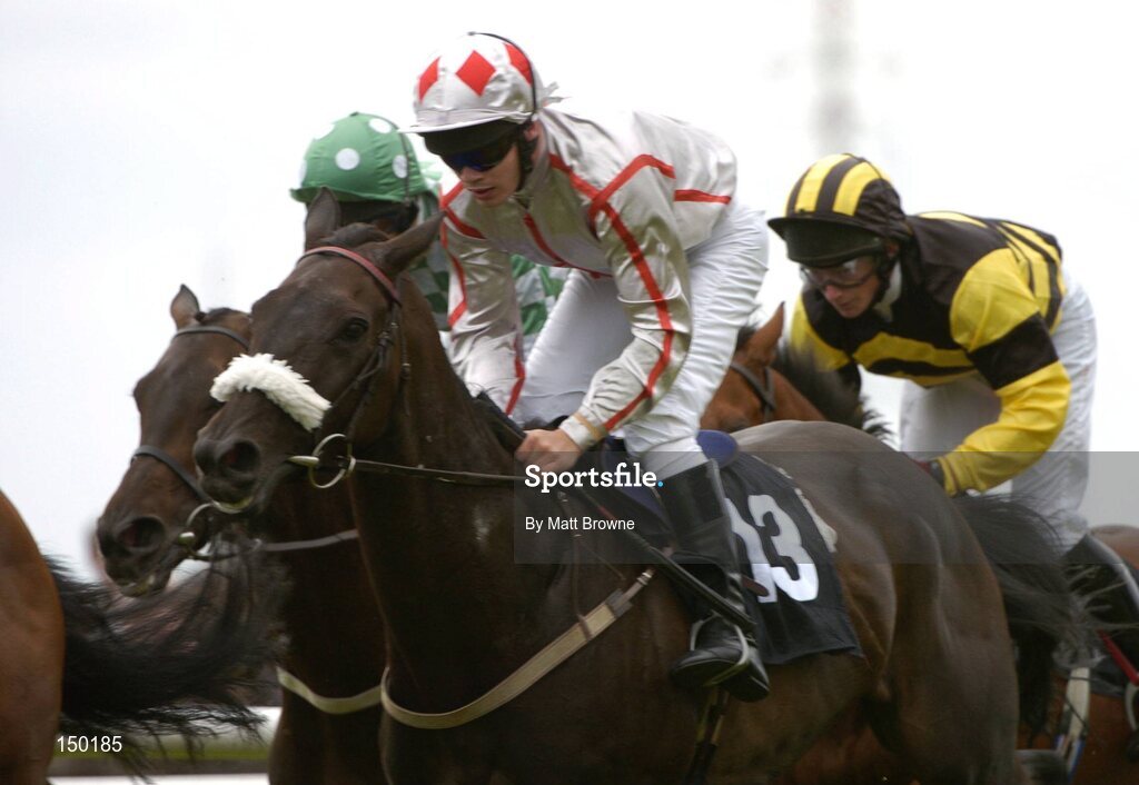 28 July 2004; Santa's Girl,13 ,with Robart Colgan up, during the HP Imaging & Digital Printing Handicap Hurdle. Galway Races, Ballybrit, Co. Galway. Picture credit; Matt Browne / SPORTSFILE