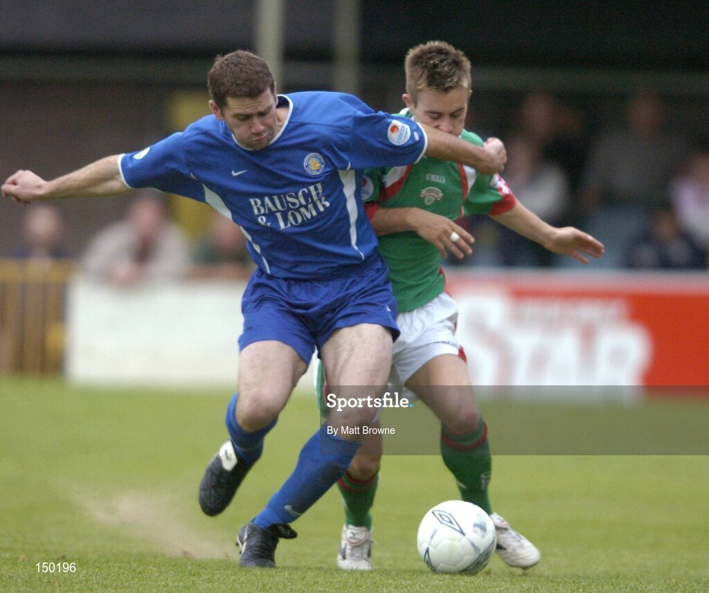 30 July 2004; David Mulcahy, Waterford United, in action against Cork City's Liam Kearney. eircom League Premier Division, Cork City v Waterford United, Turners Cross, Cork. Picture Credit; Matt Browne / SPORTSFILE