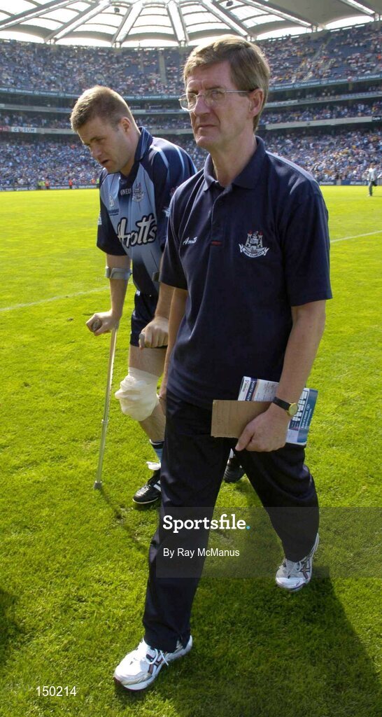 1 August 2004; Dessie Farrell leaves the field with the Dublin Chairman John Bailey. Bank of Ireland All-Ireland Football Championship, Round 4, Dublin v Roscommon, Croke Park, Dublin. Picture credit; Ray McManus / SPORTSFILE