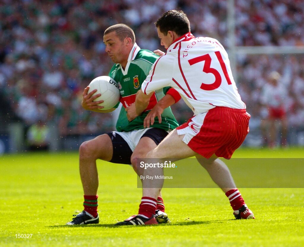 7 August 2004; Trevor Mortimer, Mayo, in action against Conor Gormley, Tyrone. Bank of Ireland All-Ireland Senior Football Championship Quarter Final, Mayo v Tyrone, Croke Park, Dublin. Picture credit; Ray McManus / SPORTSFILE