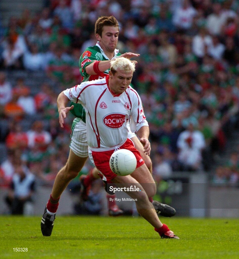7 August 2004; Owen Mulligan, Tyrone, in action against Ronan McGarrity, Mayo. Bank of Ireland All-Ireland Senior Football Championship Quarter Final, Mayo v Tyrone, Croke Park, Dublin. Picture credit; Ray McManus / SPORTSFILE