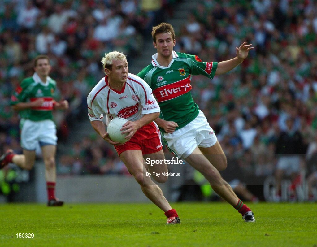 7 August 2004; Owen Mulligan, Tyrone, in action against Ronan McGarrity, Mayo. Bank of Ireland All-Ireland Senior Football Championship Quarter Final, Mayo v Tyrone, Croke Park, Dublin. Picture credit; Ray McManus / SPORTSFILE