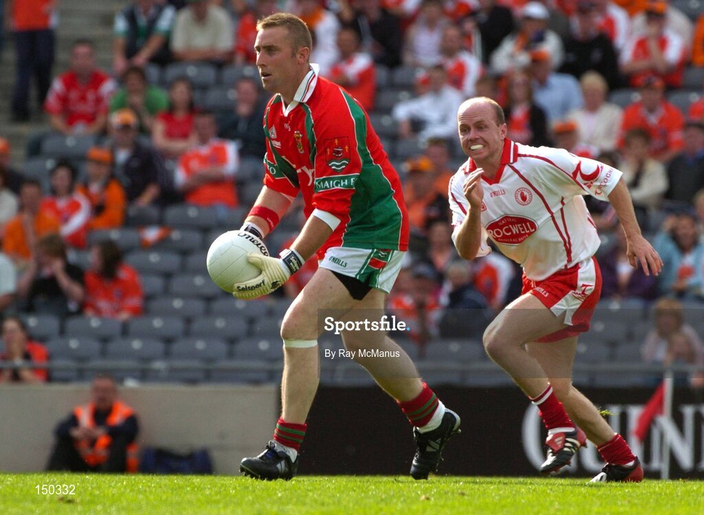 7 August 2004; Peter Burke, Mayo, in action against Peter Canavan, Tyrone. Bank of Ireland All-Ireland Senior Football Championship Quarter Final, Mayo v Tyrone, Croke Park, Dublin. Picture credit; Ray McManus / SPORTSFILE