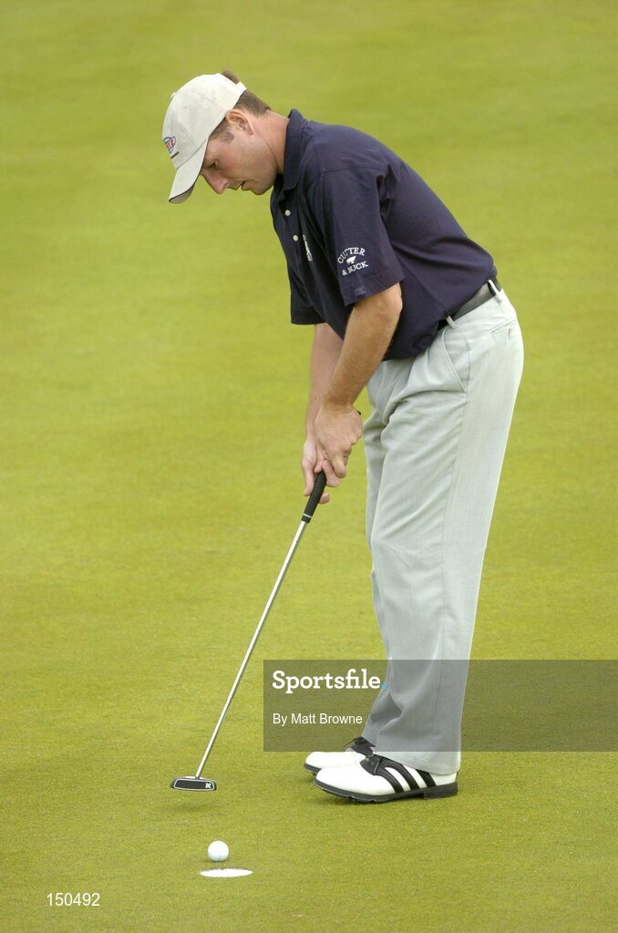 21 July 2004; David Higgins watches his putt on the 16th green during the first round. Nissan Irish Open Golf Championship, County Louth Golf Club, Baltray, Co. Louth. Picture credit; Matt Browne / SPORTSFILE