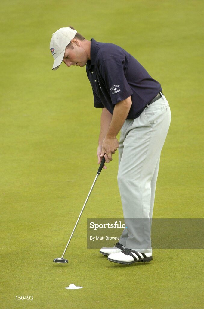 21 July 2004; David Higgins watches his putt on the 16th green during the first round. Nissan Irish Open Golf Championship, County Louth Golf Club, Baltray, Co. Louth. Picture credit; Matt Browne / SPORTSFILE