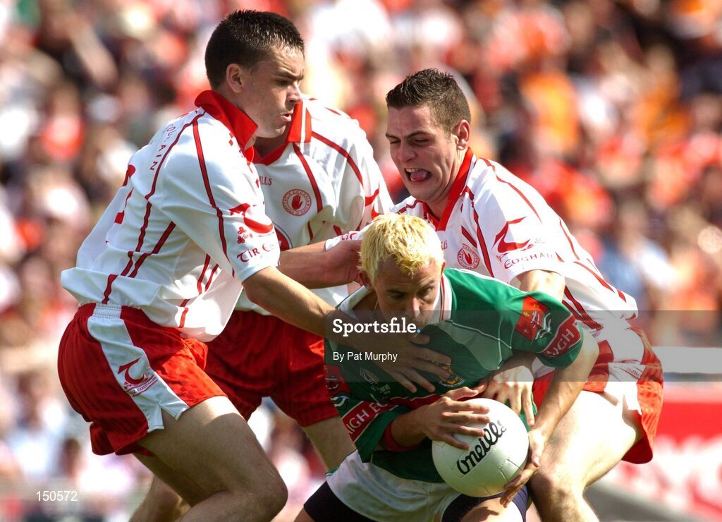 7 August 2004; Conor Gormley, Mayo, in action against Ryan McManamin, left, and Michael McGee, Tyrone. Bank of Ireland All-Ireland Senior Football Championship Quarter Final, Mayo v Tyrone, Croke Park, Dublin. Picture credit; Pat Murphy / SPORTSFILE
