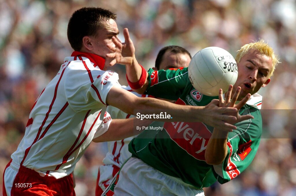 7 August 2004; Conor Mortimer, Mayo, in action against Ryan McManamin, Tyrone. Bank of Ireland All-Ireland Senior Football Championship Quarter Final, Mayo v Tyrone, Croke Park, Dublin. Picture credit; Pat Murphy / SPORTSFILE