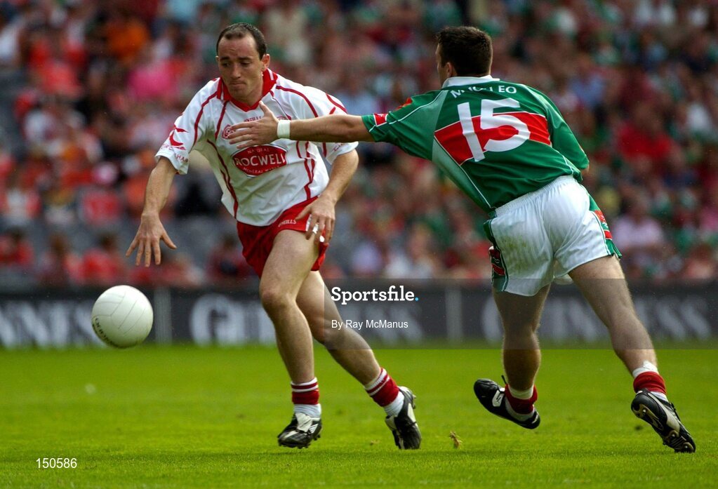 7 August 2004; Brian Dooher, Tyrone, in action against Brian Maloney, Mayo. Bank of Ireland All-Ireland Senior Football Championship Quarter Final, Mayo v Tyrone, Croke Park, Dublin. Picture credit; Ray McManus / SPORTSFILE