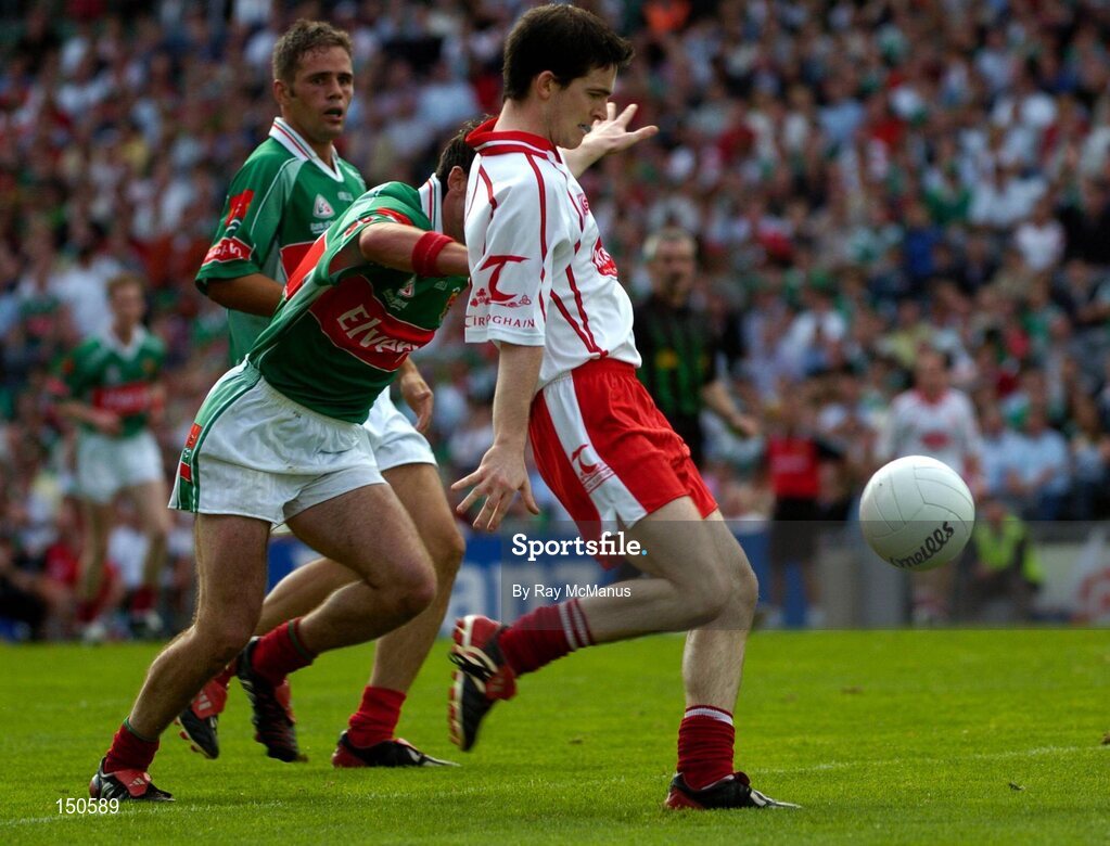 7 August 2004; Mark Harte, Tyrone, in action against Conor Moran, Mayo. Bank of Ireland All-Ireland Senior Football Championship Quarter Final, Mayo v Tyrone, Croke Park, Dublin. Picture credit; Ray McManus / SPORTSFILE
