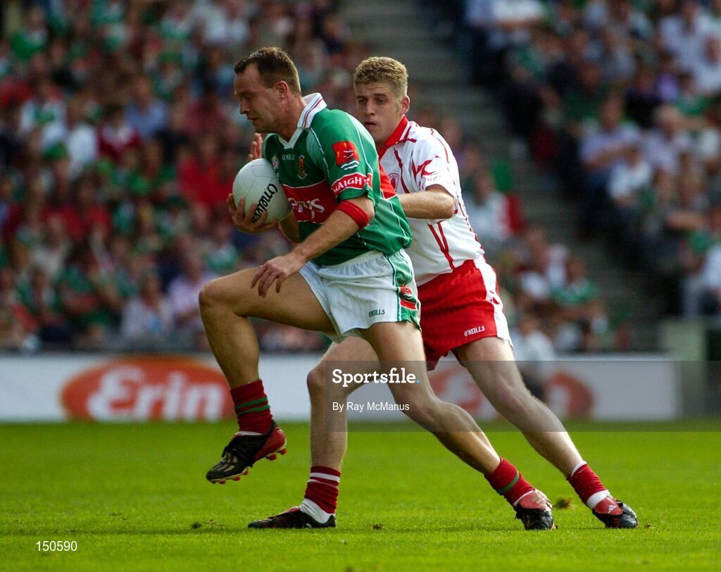 7 August 2004; David Brady, Mayo, in action against Kevin Hughes, Tyrone. Bank of Ireland All-Ireland Senior Football Championship Quarter Final, Mayo v Tyrone, Croke Park, Dublin. Picture credit; Ray McManus / SPORTSFILE