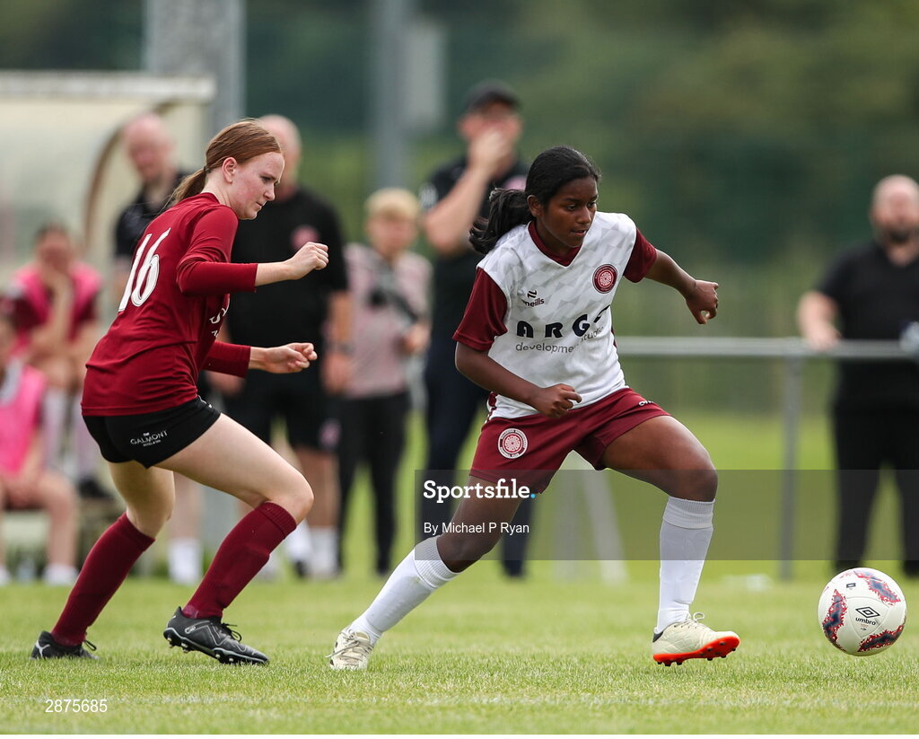 14 July 2024; Blossom Pednekar of Killester Donnycarney FC in action against Alison McGreevey of Athenry during the FAI Women's Under 17 Cup final match between Athenry and Killester Donnycarney FC at Mullingar Athletic FC in Gainstown, Westmeath. Photo by Michael P Ryan/Sportsfile