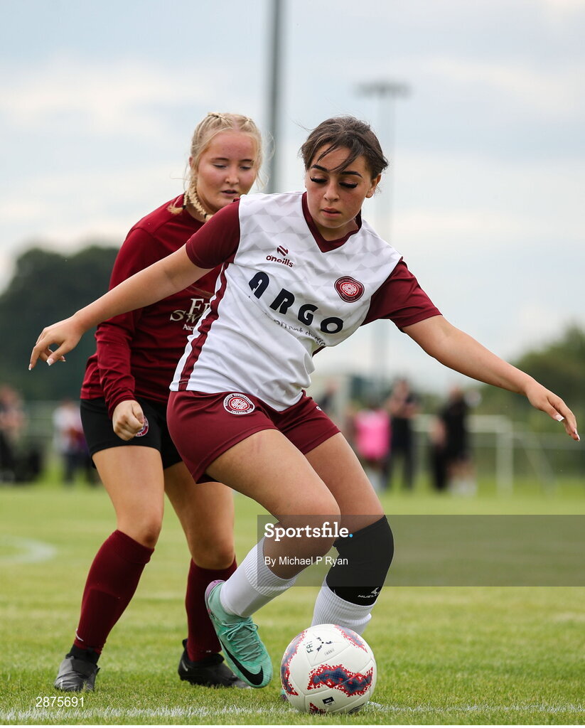 14 July 2024; Emmy Jo Caffery of Killester Donnycarney FC in action against Sophie Costelloe of Athenry during the FAI Women's Under 17 Cup final match between Athenry and Killester Donnycarney FC at Mullingar Athletic FC in Gainstown, Westmeath. Photo by Michael P Ryan/Sportsfile