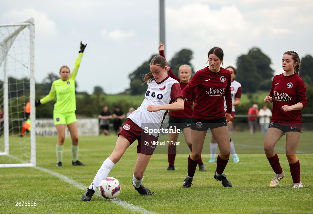 14 July 2024; Victoria Dempsey of Killester Donnycarney FC attempts to keep the ball in play during the FAI Women's Under 17 Cup final match between Athenry and Killester Donnycarney FC at Mullingar Athletic FC in Gainstown, Westmeath. Photo by Michael P Ryan/Sportsfile