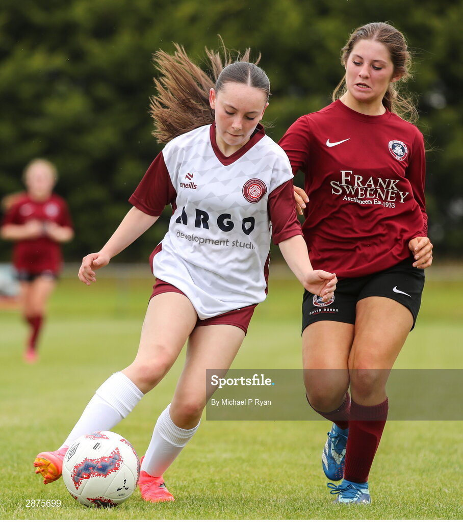 14 July 2024; Ava O'Brien of Killester Donnycarney FC in action against Mollie Noone of Athenry during the FAI Women's Under 17 Cup final match between Athenry and Killester Donnycarney FC at Mullingar Athletic FC in Gainstown, Westmeath. Photo by Michael P Ryan/Sportsfile