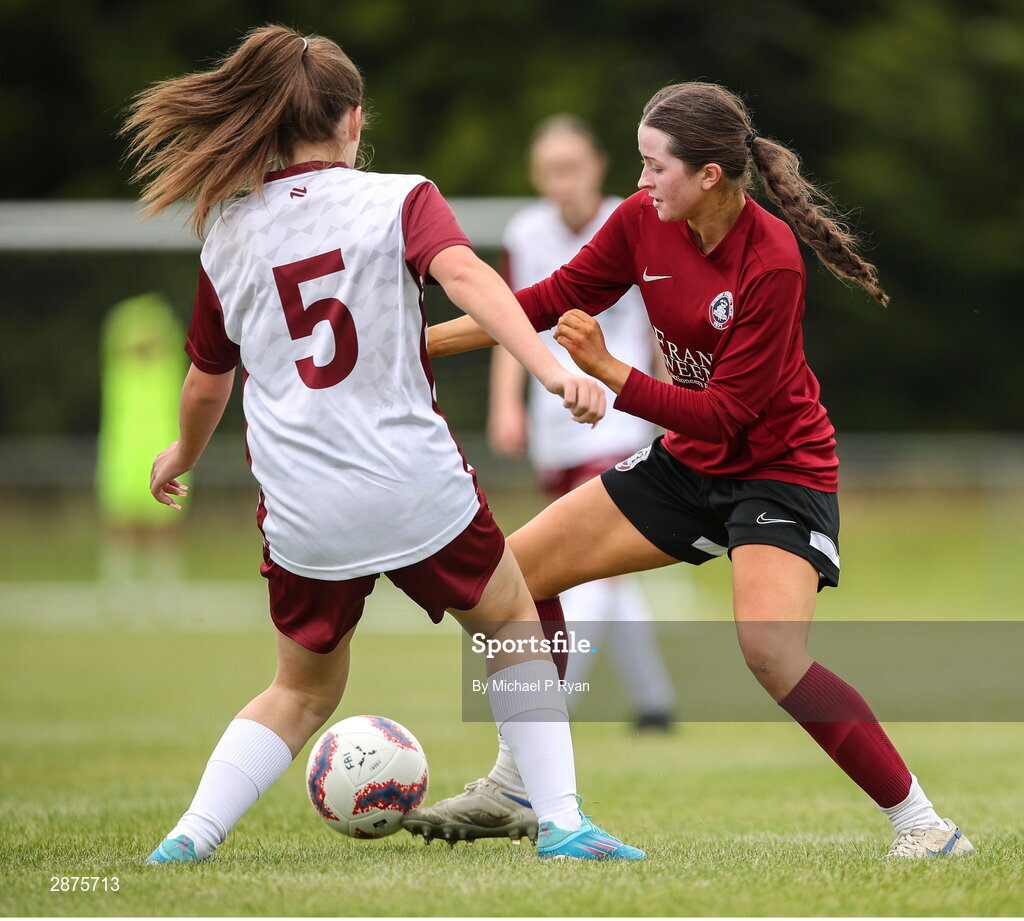 14 July 2024; Kerri O'Driscoll of Athenry in action against Jessica White of Killester Donnycarney FC during the FAI Women's Under 17 Cup final match between Athenry and Killester Donnycarney FC at Mullingar Athletic FC in Gainstown, Westmeath. Photo by Michael P Ryan/Sportsfile