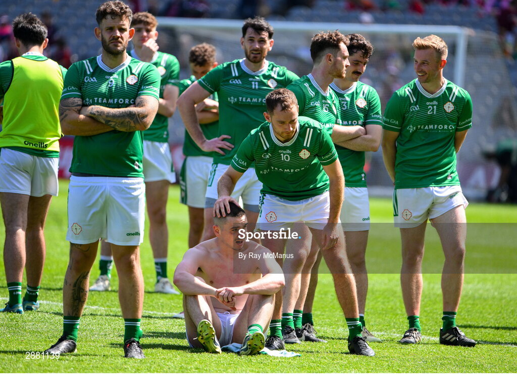 14 July 2024; Matthew Tierney of London is comforted by his team mate Matthew Joyce after the GAA Football All-Ireland Junior Championship final between London and New York at Croke Park in Dublin. Photo by Ray McManus/Sportsfile