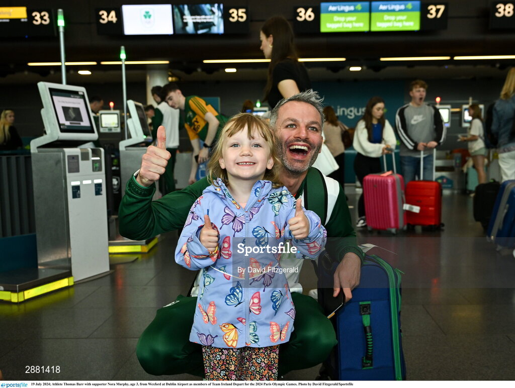 19 July 2024; Athlete Thomas Barr with supporter Nora Murphy, age 3, from Wexford at Dublin Airport as members of Team Ireland Depart for the 2024 Paris Olympic Games. Photo by David Fitzgerald/Sportsfile