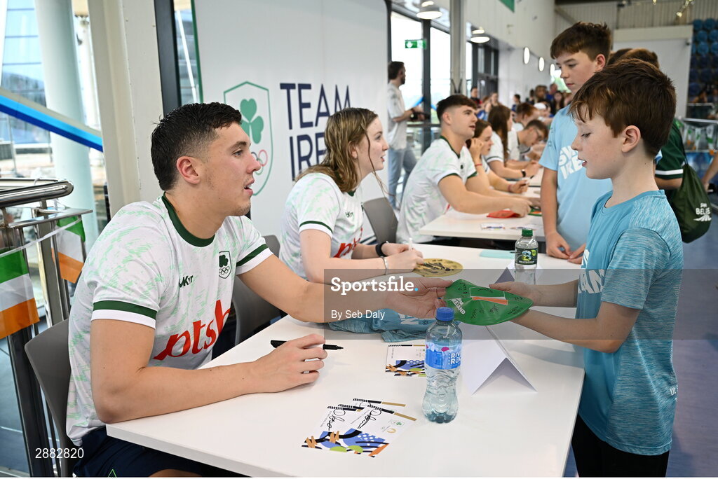 20 July 2024; Darragh Greene signs his autograph for a young supporter during a Team Ireland Paris 2024 Aquatics team training session at the National Aquatic Centre on the Sport Ireland Campus in Dublin. Photo by Seb Daly/Sportsfile