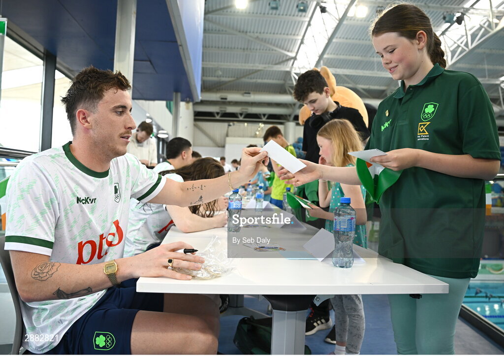 20 July 2024; Max McCusker signs his autograph for a young supporter during a Team Ireland Paris 2024 Aquatics team training session at the National Aquatic Centre on the Sport Ireland Campus in Dublin. Photo by Seb Daly/Sportsfile