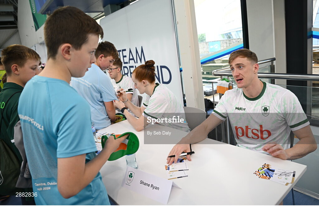 20 July 2024; Shane Ryan signs his autograph for a young supporter during a Team Ireland Paris 2024 Aquatics team training session at the National Aquatic Centre on the Sport Ireland Campus in Dublin. Photo by Seb Daly/Sportsfile