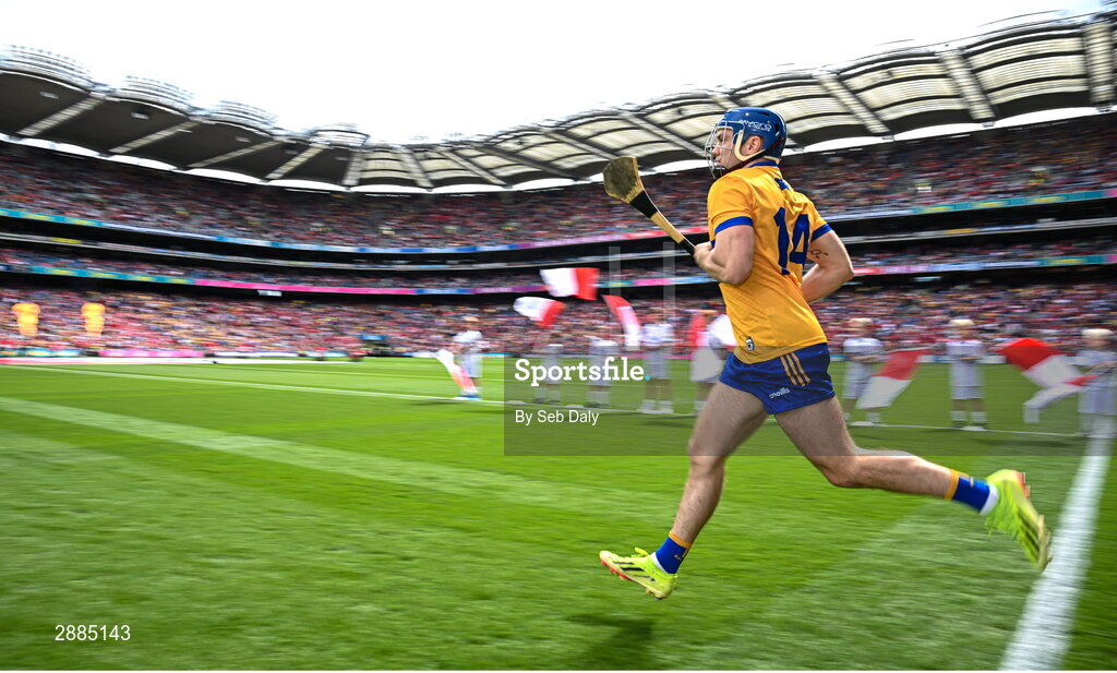 21 July 2024; Shane O'Donnell of Clare runs out onto the pitch before the GAA Hurling All-Ireland Senior Championship Final match between Clare and Cork at Croke Park in Dublin. Photo by Seb Daly/Sportsfile