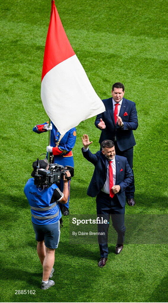 21 July 2024; Former Cork player Donal Óg Cusack waves to the crowd as part of the 1999 Jubilee Cork team ahead of the GAA Hurling All-Ireland Senior Championship Final between Clare and Cork at Croke Park in Dublin. Photo by Daire Brennan/Sportsfile