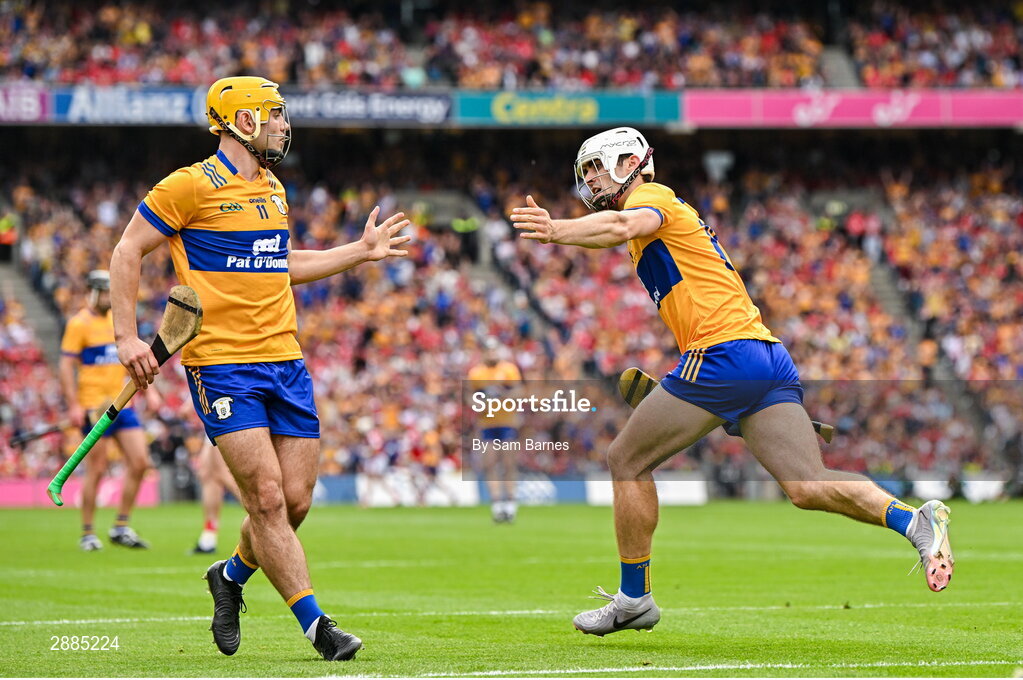 21 July 2024; Aidan McCarthy of Clare, right, celebrates with team-mate Mark Rodgers after scoring his side's first goal during the GAA Hurling All-Ireland Senior Championship Final between Clare and Cork at Croke Park in Dublin. Photo by Sam Barnes/Sportsfile