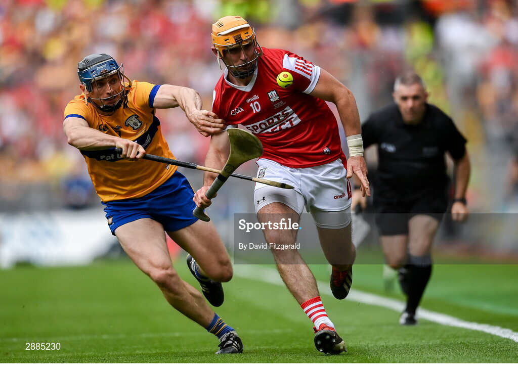 21 July 2024; Declan Dalton of Cork in action against David McInerney of Clare during the GAA Hurling All-Ireland Senior Championship Final between Clare and Cork at Croke Park in Dublin. Photo by David Fitzgerald/Sportsfile