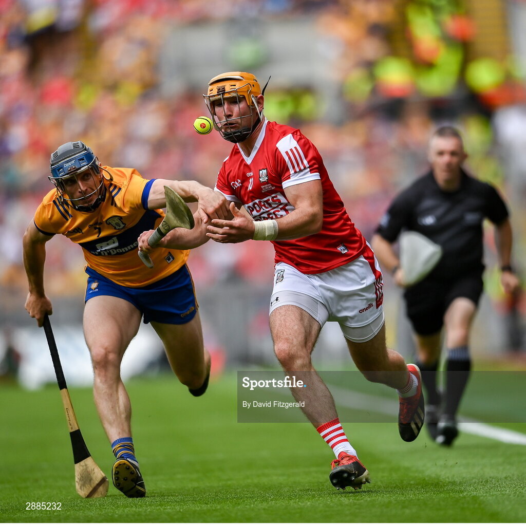 21 July 2024; Declan Dalton of Cork in action against David McInerney of Clare during the GAA Hurling All-Ireland Senior Championship Final between Clare and Cork at Croke Park in Dublin. Photo by David Fitzgerald/Sportsfile