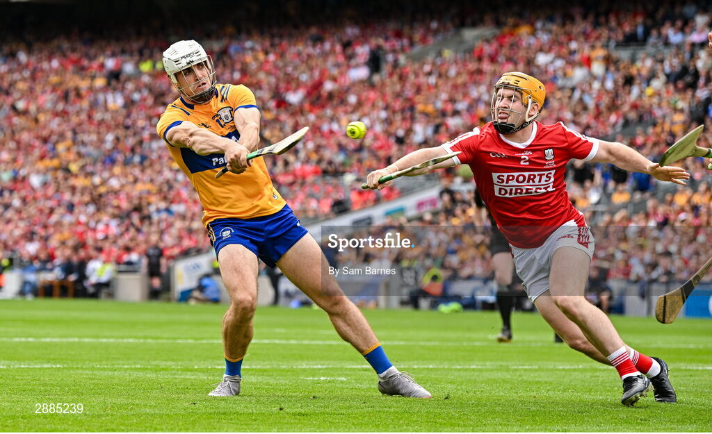 21 July 2024; Aidan McCarthy of Clare scores his side's first goal despite the efforts of Niall O'Leary of Cork during the GAA Hurling All-Ireland Senior Championship Final between Clare and Cork at Croke Park in Dublin. Photo by Sam Barnes/Sportsfile