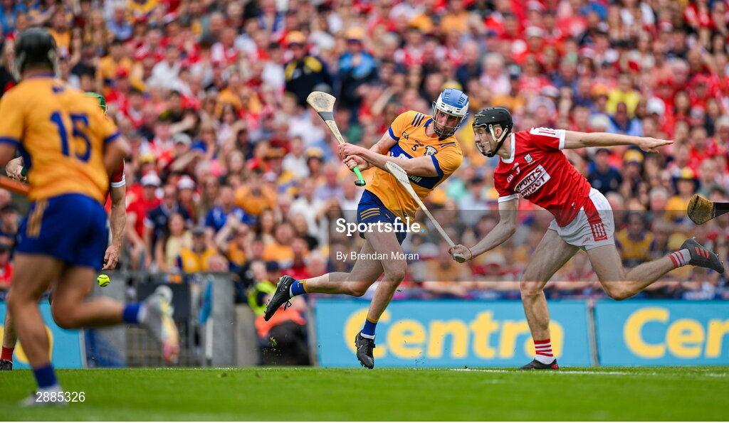 21 July 2024; Diarmuid Ryan of Clare is hooked by Eoin Downey of Cork during the GAA Hurling All-Ireland Senior Championship Final between Clare and Cork at Croke Park in Dublin. Photo by Brendan Moran/Sportsfile