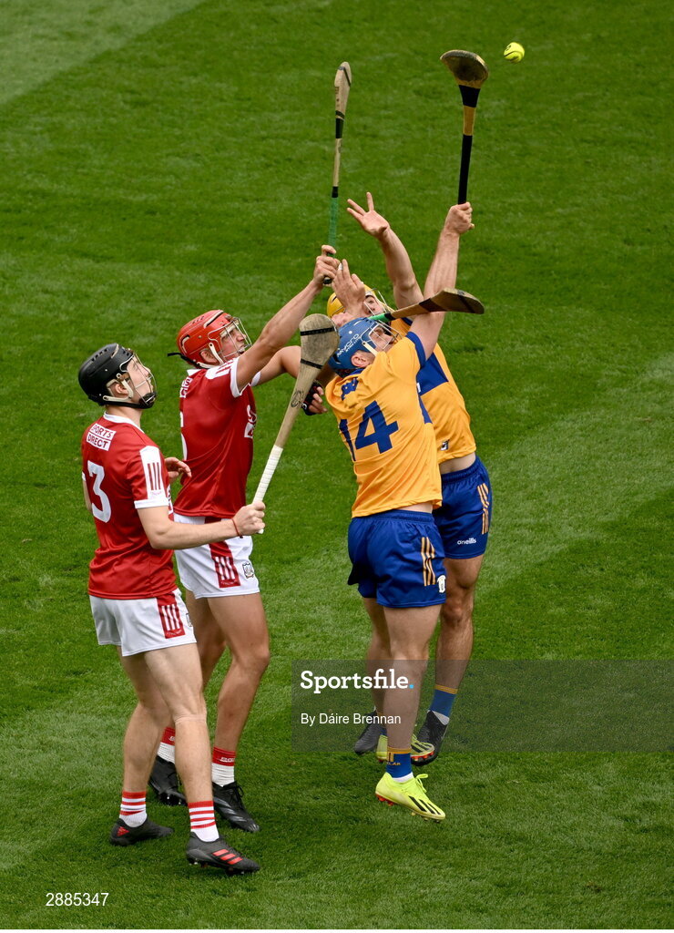 21 July 2024; Shane O'Donnell, left, and Mark Rodgers of Clare in action against Eoin Downey, left, and Ciarán Joyce of Cork during the GAA Hurling All-Ireland Senior Championship Final between Clare and Cork at Croke Park in Dublin. Photo by Daire Brennan/Sportsfile