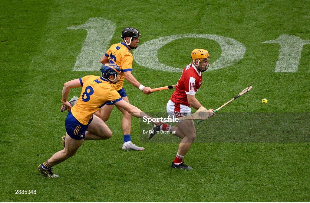 21 July 2024; Niall O'Leary of Cork in action against David Fitzgerald, left, and David Reidy of Clare during the GAA Hurling All-Ireland Senior Championship Final between Clare and Cork at Croke Park in Dublin. Photo by Daire Brennan/Sportsfile