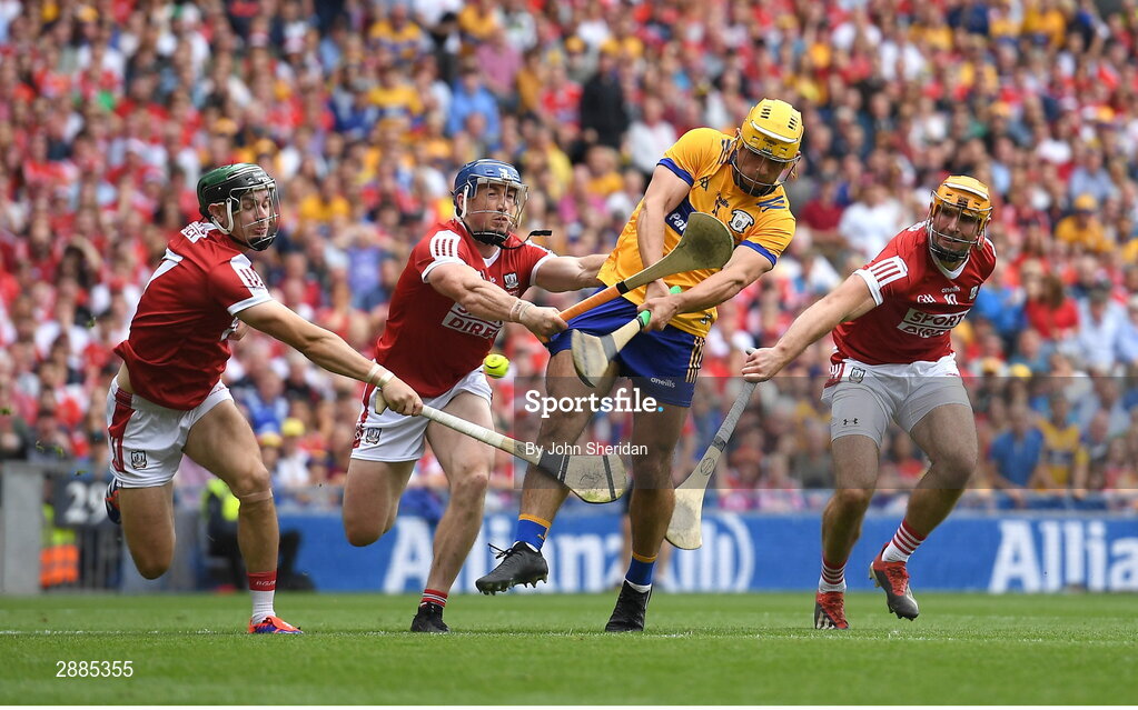 21 July 2024; Mark Rodgers of Clare shoots to score his side's second goal despite the efforts of Seán O'Donoghue of Cork during the GAA Hurling All-Ireland Senior Championship Final between Clare and Cork at Croke Park in Dublin. Photo by John Sheridan/Sportsfile