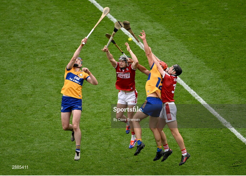 21 July 2024; David Fitzgerald, left, and Peter Duggan of Clare in action against Mark Coleman, left and Eoin Downey of Cork during the GAA Hurling All-Ireland Senior Championship Final between Clare and Cork at Croke Park in Dublin. Photo by Daire Brennan/Sportsfile