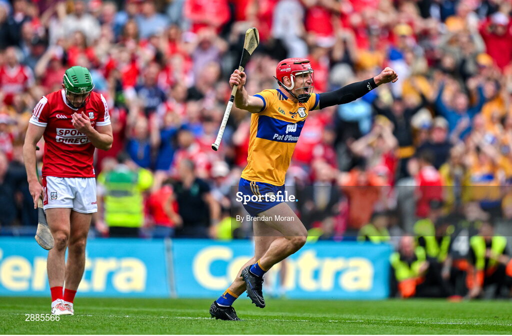 21 July 2024; John Conlon of Clare celebrates as Robbie O'Flynn of Cork looks dejected at the final whistle of the GAA Hurling All-Ireland Senior Championship Final between Clare and Cork at Croke Park in Dublin. Photo by Brendan Moran/Sportsfile