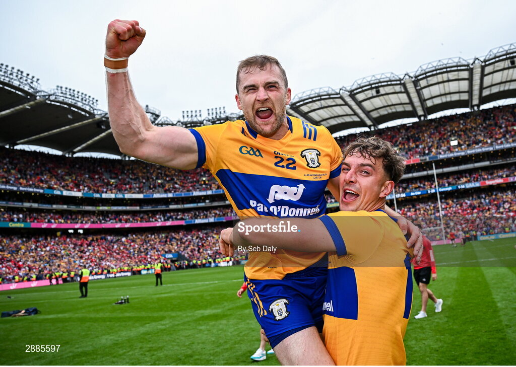 21 July 2024; Clare players Seadna Morey, left, and Peter Duggan celebrate after their side's victory in the GAA Hurling All-Ireland Senior Championship Final match between Clare and Cork at Croke Park in Dublin. Photo by Seb Daly/Sportsfile