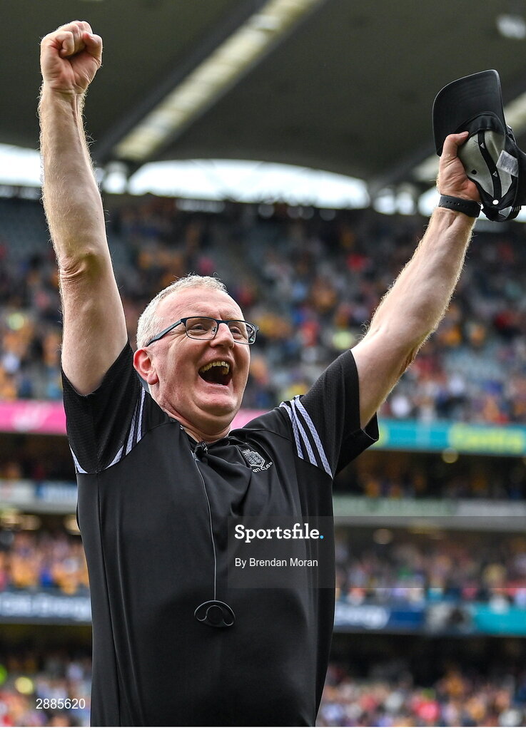 21 July 2024; Clare manager Brian Lohan celebrates as his captain Tony Kelly lifts the Liam MacCarthy cup after the GAA Hurling All-Ireland Senior Championship Final between Clare and Cork at Croke Park in Dublin. Photo by Brendan Moran/Sportsfile