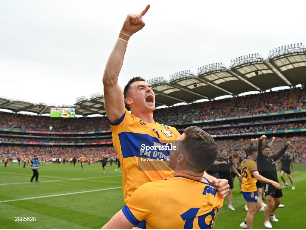 21 July 2024; Ryan Taylor of Clare, top, celebrates with team-mate Paul Flanagan  after their side's victory in the GAA Hurling All-Ireland Senior Championship Final between Clare and Cork at Croke Park in Dublin. Photo by Sam Barnes/Sportsfile