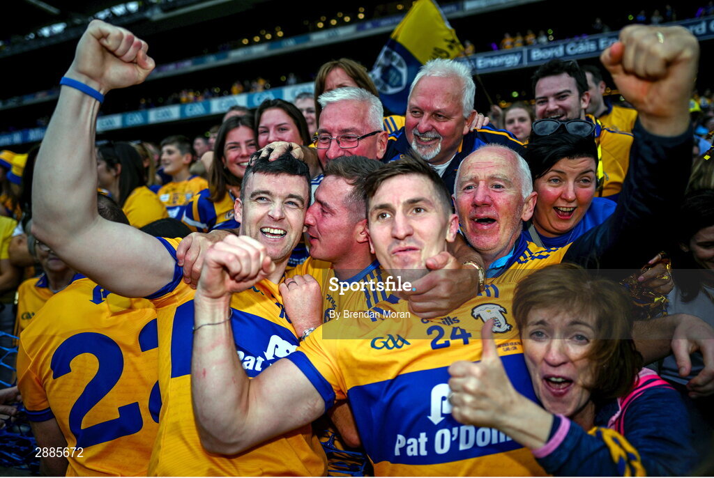 21 July 2024; Tony Kelly, left, and Ian Galvin of Clare celebrate with supporters after the GAA Hurling All-Ireland Senior Championship Final between Clare and Cork at Croke Park in Dublin. Photo by Brendan Moran/Sportsfile