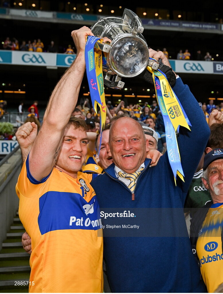 21 July 2024; Shane O'Donnell of Clare and two time All-Ireland winning Clare manager Ger Loughnane celebrate with the Liam MacCarthy cup after the GAA Hurling All-Ireland Senior Championship Final between Clare and Cork at Croke Park in Dublin. Photo by Stephen McCarthy/Sportsfile