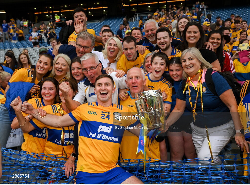 21 July 2024; Ian Galvin of Clare, family and friends celebrate with the Liam MacCarthy cup after the GAA Hurling All-Ireland Senior Championship Final between Clare and Cork at Croke Park in Dublin. Photo by Stephen McCarthy/Sportsfile