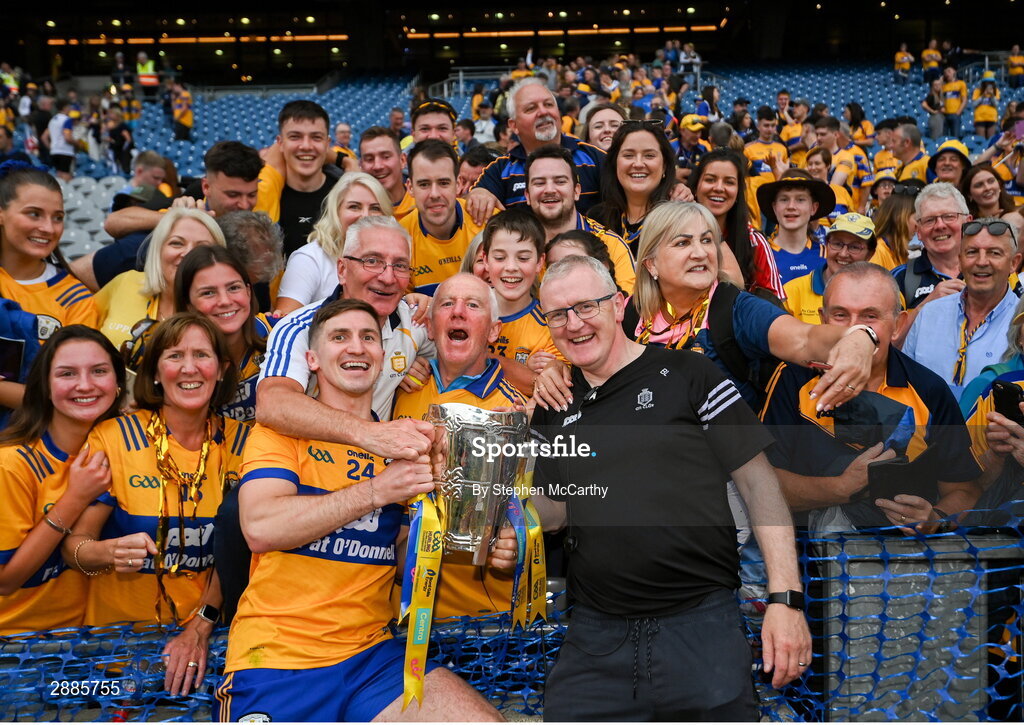 21 July 2024; Ian Galvin of Clare and manager Brian Lohan, family and friends celebrate with the Liam MacCarthy cup after the GAA Hurling All-Ireland Senior Championship Final between Clare and Cork at Croke Park in Dublin. Photo by Stephen McCarthy/Sportsfile
