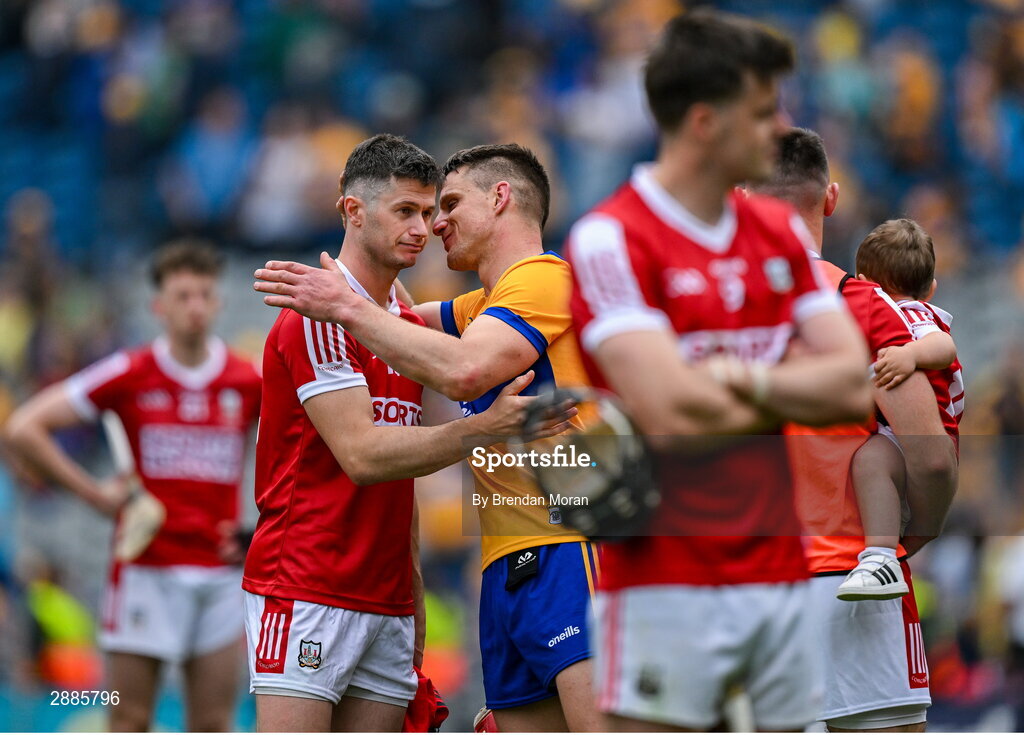 21 July 2024; Séamus Harnedy of Cork is consoled by John Conlon of Clare after the GAA Hurling All-Ireland Senior Championship Final between Clare and Cork at Croke Park in Dublin. Photo by Brendan Moran/Sportsfile