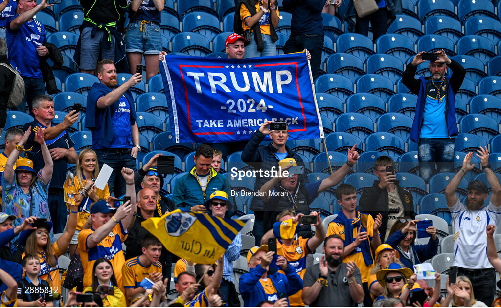 21 July 2024; A Donald Trump supporter, among Clare supporters, after the GAA Hurling All-Ireland Senior Championship Final between Clare and Cork at Croke Park in Dublin. Photo by Brendan Moran/Sportsfile
