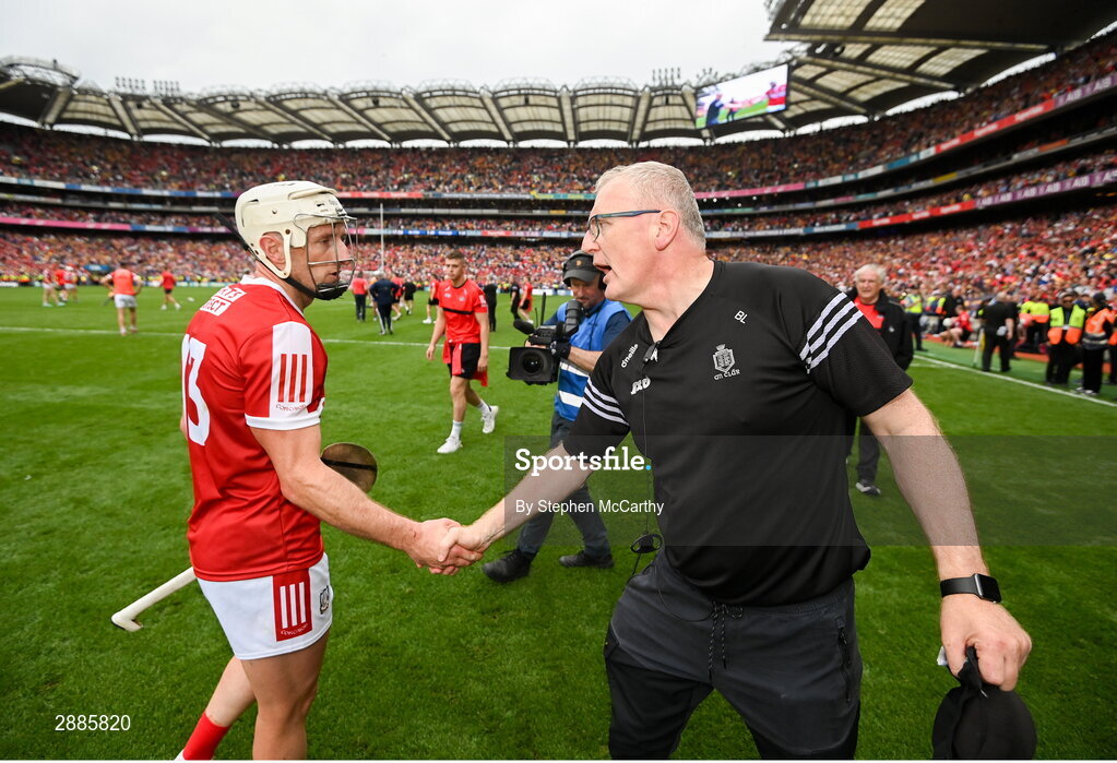 21 July 2024; Clare manager Brian Lohan shakes hands with Patrick Horgan of Cork after the GAA Hurling All-Ireland Senior Championship Final between Clare and Cork at Croke Park in Dublin. Photo by Stephen McCarthy/Sportsfile