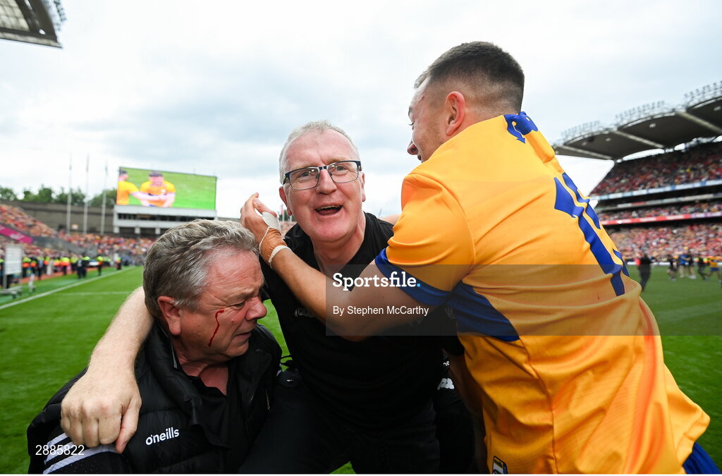 21 July 2024; Clare manager Brian Lohan celebrates with David Reidy, right, after winning the GAA Hurling All-Ireland Senior Championship Final between Clare and Cork at Croke Park in Dublin. Photo by Stephen McCarthy/Sportsfile