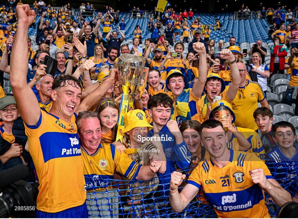 21 July 2024; Clare players Peter Duggan, left, and Ryan Taylor celebrate with supporters after their side's victory in the GAA Hurling All-Ireland Senior Championship Final match between Clare and Cork at Croke Park in Dublin. Photo by Seb Daly/Sportsfile