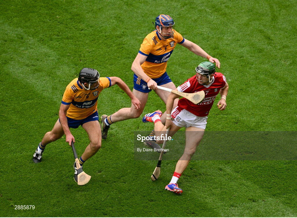 21 July 2024; Mark Coleman of Cork in action against Cathal Malone, left, and David Fitzgerald of Clare during the GAA Hurling All-Ireland Senior Championship Final between Clare and Cork at Croke Park in Dublin. Photo by Daire Brennan/Sportsfile