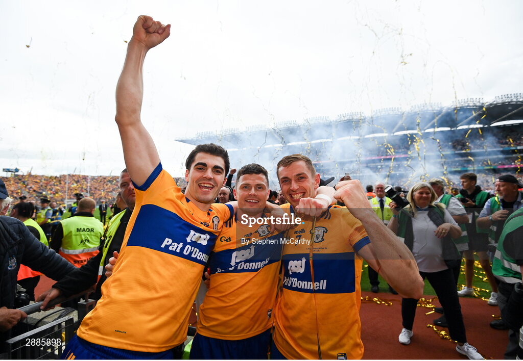21 July 2024; Clare players, from left, Aidan McCarthy, Paul Flanagan and David McInerney celebrate after the GAA Hurling All-Ireland Senior Championship Final between Clare and Cork at Croke Park in Dublin. Photo by Stephen McCarthy/Sportsfile